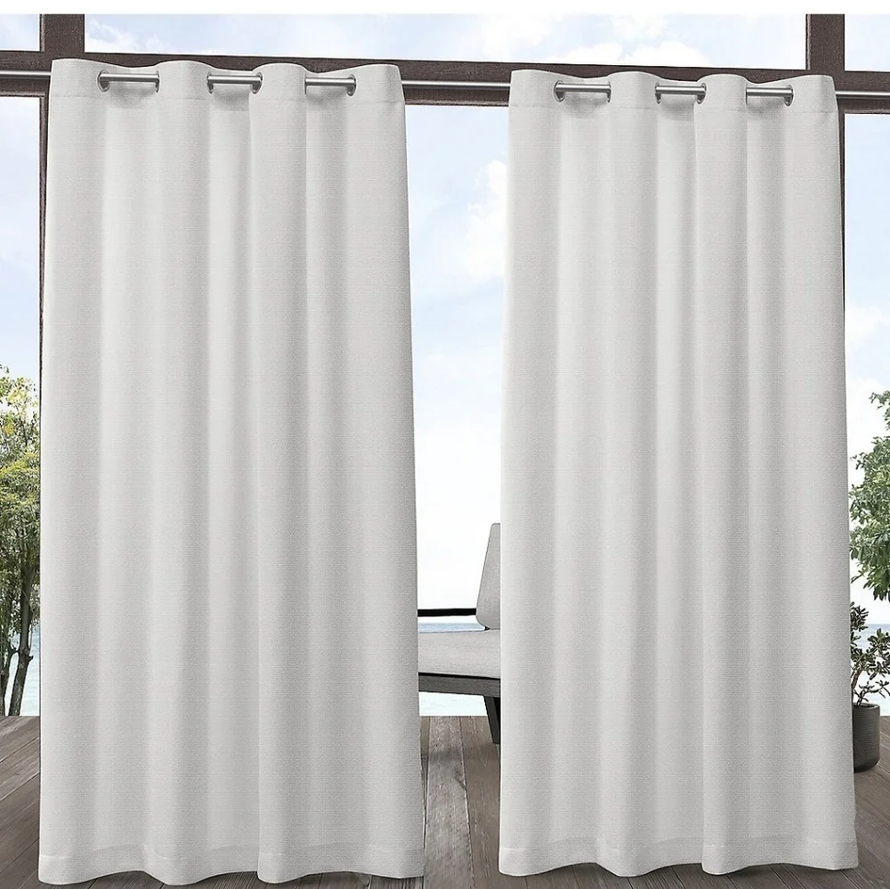 New Indoor/outdoor curtains. 2 panels 54x108 ea. Aztec white color